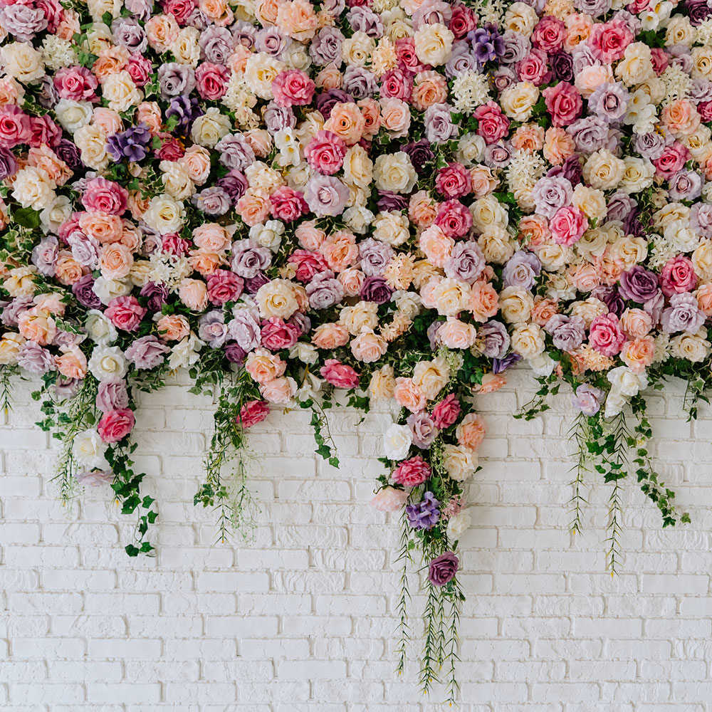 Beautiful Decorative Colorful Roses on Brick Wall